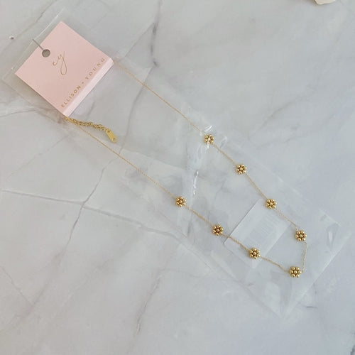 Colar Flor com Contas Douradas – Aço Inoxidável à Prova d’água